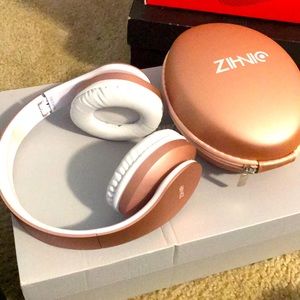 Pink Bluetooth headphones
